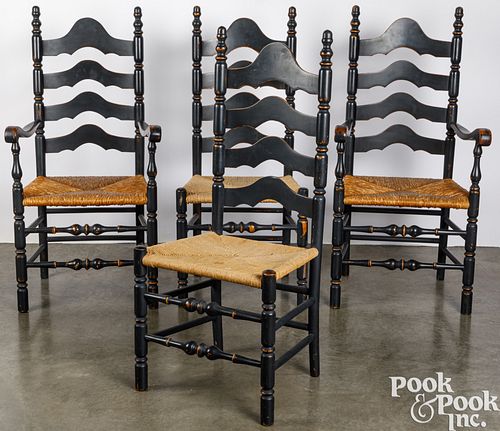 Four contemporary ladderback chairs