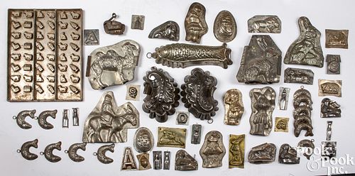 Large group of tin candy and food molds
