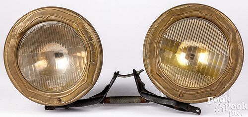 Pair of early Tilt Ray automobile headlights