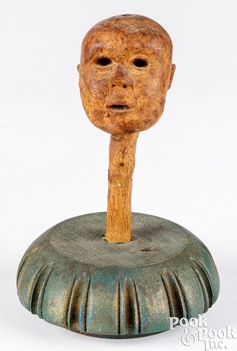 Carved burl head of a man