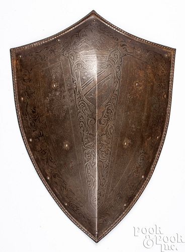 Engraved iron shield