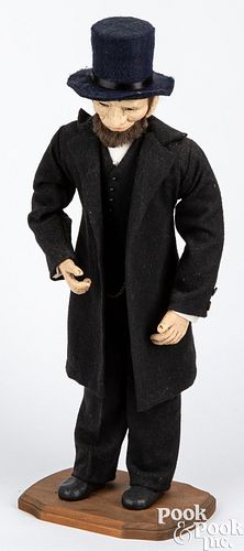 Felt and composition figure of Abraham Lincoln