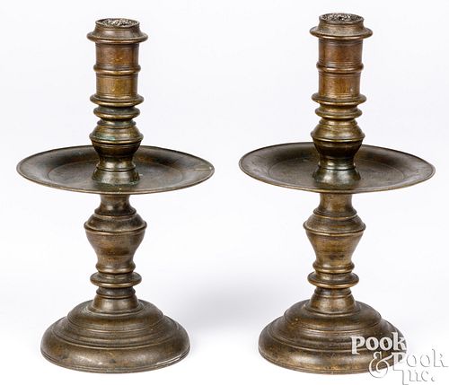 Pair of brass Heemskirk candlesticks, 17th c.