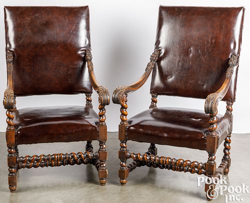 Pair of Gothic style carved armchairs