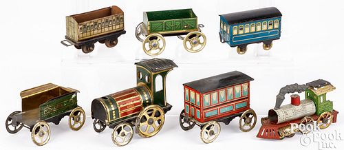 Two tin lithograph train set penny/nickel toys