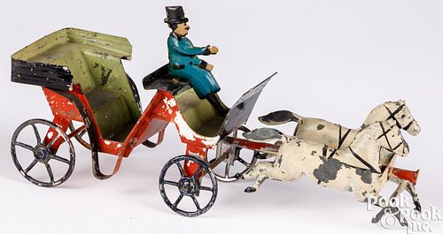 Painted tin horse drawn carriage, with driver