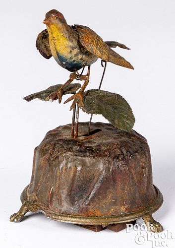 German painted tin clockwork bird