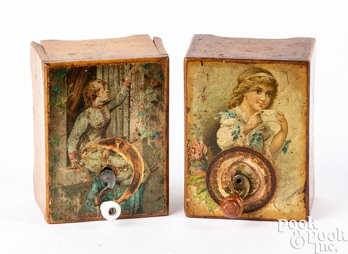 Two small paper lithograph hand crank music boxes