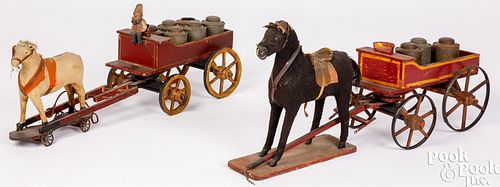 Two painted wood horse drawn buckboard wagon