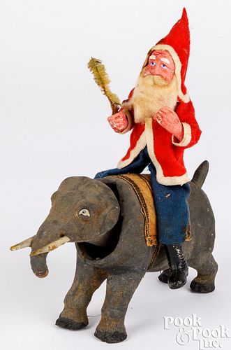 Composition Santa Claus riding an elephant