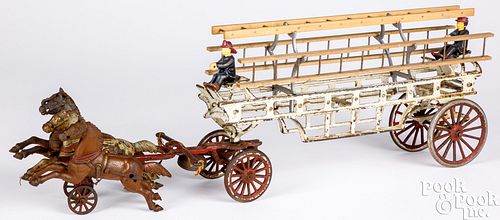 Cast iron horse drawn ladder wagon