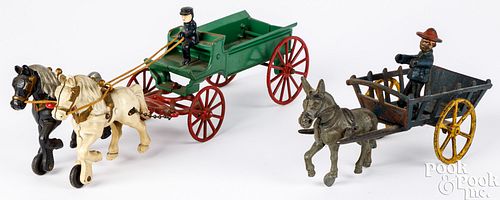 Two Kenton cast iron animal drawn wagons