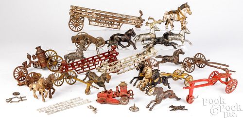 Large group of cast iron horse drawn parts