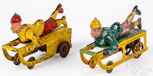 Two Dayton pressed steel boy on sled hill climbers