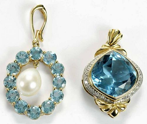 Two 14kt. and Blue Topaz Pendants