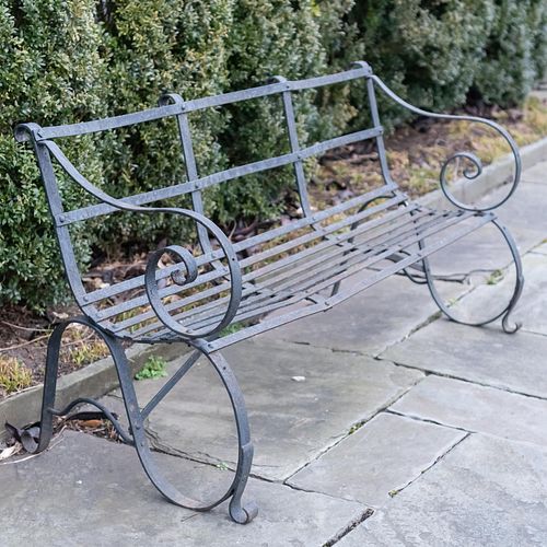 Regency Style Cast Iron Garden Bench Together with a Painted Cast Iron Garden Bench