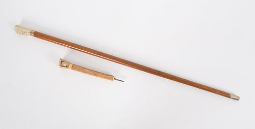 An 1876 Walking Stick and a Handle