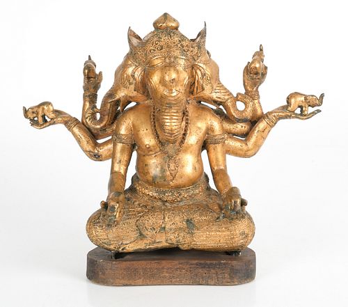 A Bronze Three Headed Ganesha