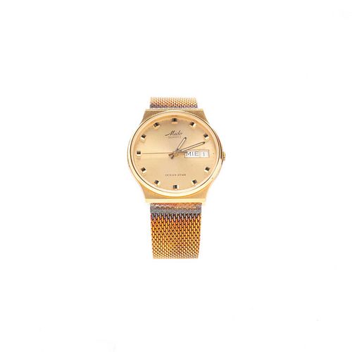 Reloj Mido Ocean Star. Movimiento de cuarzo. Caja circular en acero dorado de 33 mm. Carátula color dorado con índices de cuad...
