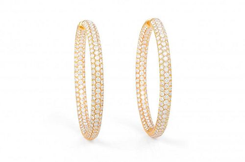 A Pair of Gold Diamond Hoop Earrings
