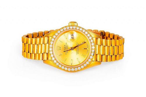 A Rolex Oyster Perpetual Datejust Lady's Gold Watch