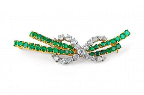 An Oscar Heyman Gold, Diamond and Emerald Ribbon Brooch