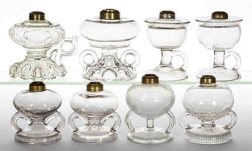 ASSORTED GLASS KEROSENE FOOTED FINGER LAMPS, LOT OF EIGHT