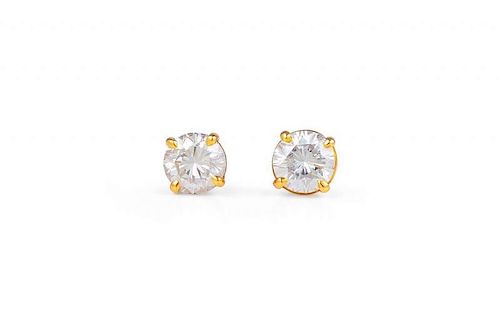 A Pair of Gold and Diamond Studs