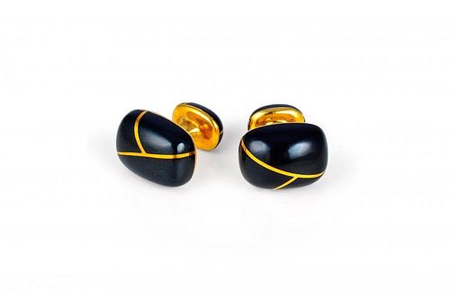 A Pair of Tiffany & Co. Black Enamel and Gold Cufflinks