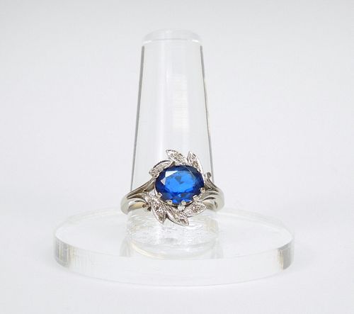 14K White Gold & Faceted Blue Stone Ring.