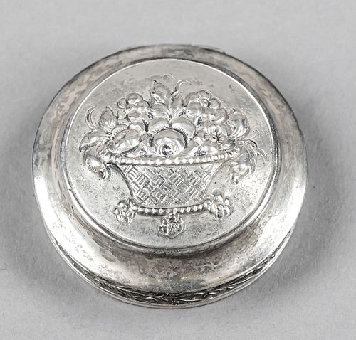 Round pill box, Sweden, 20th century, silver 830/000, gilding inside, straight wall, domed and hinged hinged lid with relief decoration flower basket,