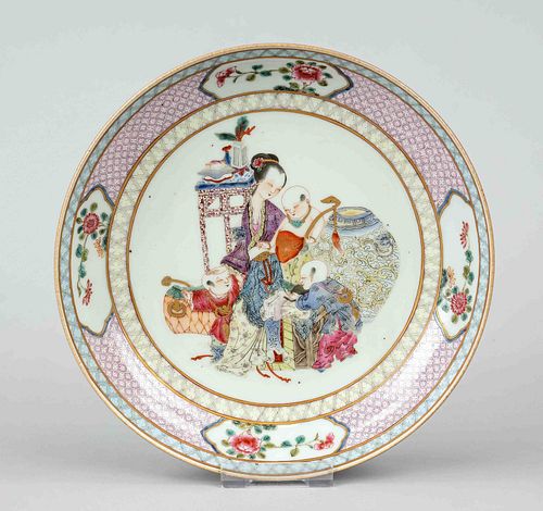 Raspberry Qing style Famille Rose plate, China, 20th c., porcelain with exalted polychrome glaze painting of children and palace lady according to ear