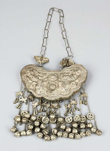 Jewelry plaque, China, 19th/20th c., chased white metal with numerous shimmering bells and necklace ribbon, lions, dragons, butterflies and flower hea