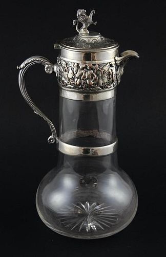 Cut glass claret jug with silver plated mounts