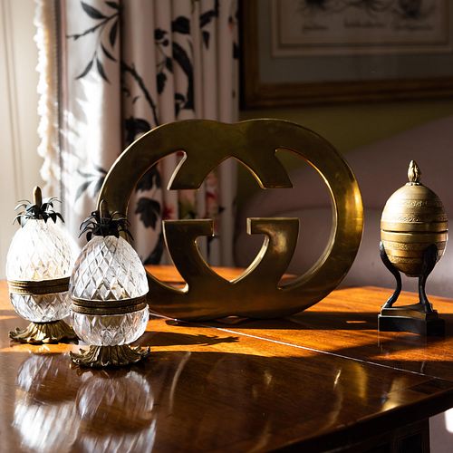 Group of Gilt-Metal-Mounted Table Lighters and a Gucci Paperweight