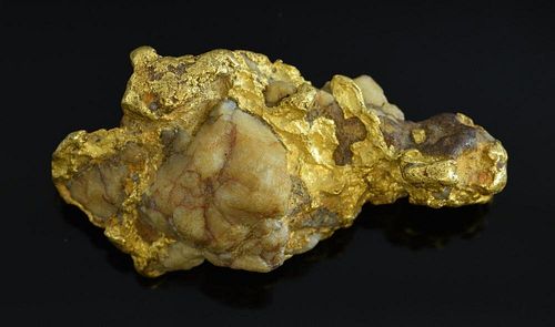 Gold nugget in original quartz matrix, gross weight 49.6 grams Length 4.6 x 2.6 cm