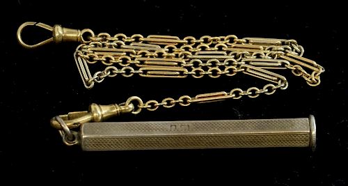 Gold Albert watch chain with bar and round links, and a silver cigar piercer