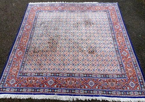 Persian type rug  the centre with repeating floral medallions, 209cm by 209cm