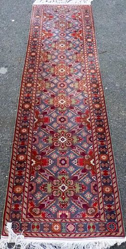 Persian type blue ground runner with repeating medallions, 296cm x 85cm