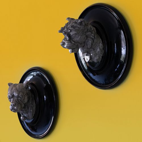 Pair of Silver-Plate Dog Trophies Mounted on Ebonized Plaques
