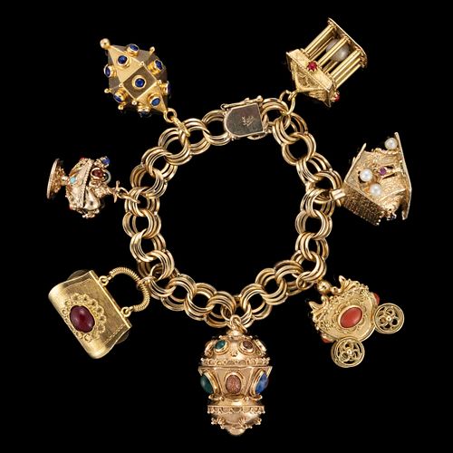 VINTAGE 14K YELLOW GOLD CHARM BRACELET WITH 14K AND 18K GOLD CHARMS