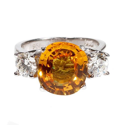 Yellow sapphire, diamond and platinum ring