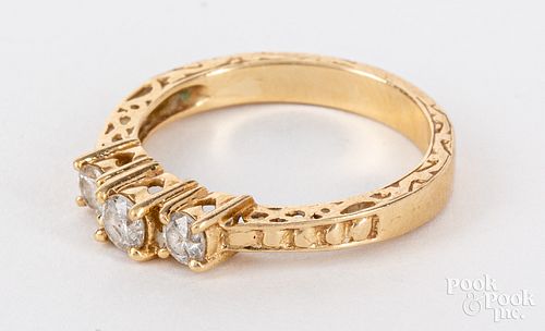 14K gold and diamond three stone ring