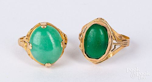 Two 18K gold and gemstone rings