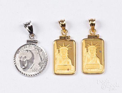 Two 2g fine gold pendants, etc.