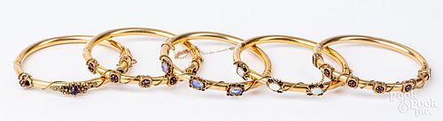 Five 14K gold and gemstone bangle bracelets