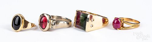 Four 14K gold and gemstone rings