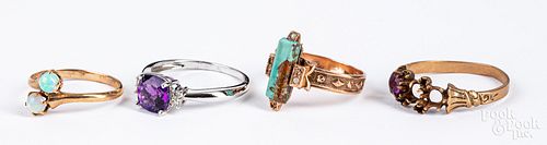 Eight 10K gold and gemstone rings
