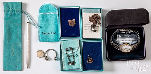 Tiffany & Co. jewelry, wristwatch, and pen