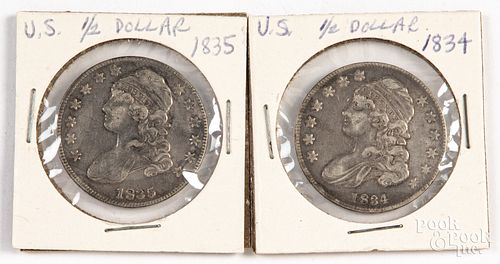 Two capped liberty silver half dollars